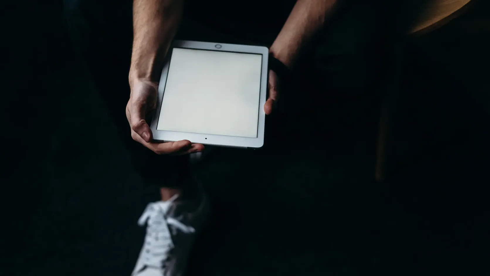 Computers Costco: 5 Affordable Options That Still Last 6 A person holding a tablet with a happy expression