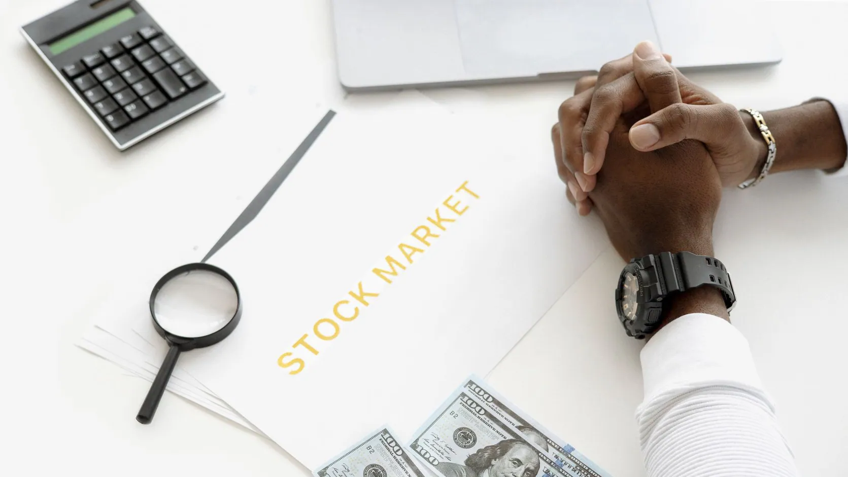 Computershare: 5 Essential Services That Save Time 4 A stack of stock transfer documents on a desk with a computershare logo in the background